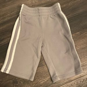 The children’s place grey sweatpants with white stripes. 6-9 months